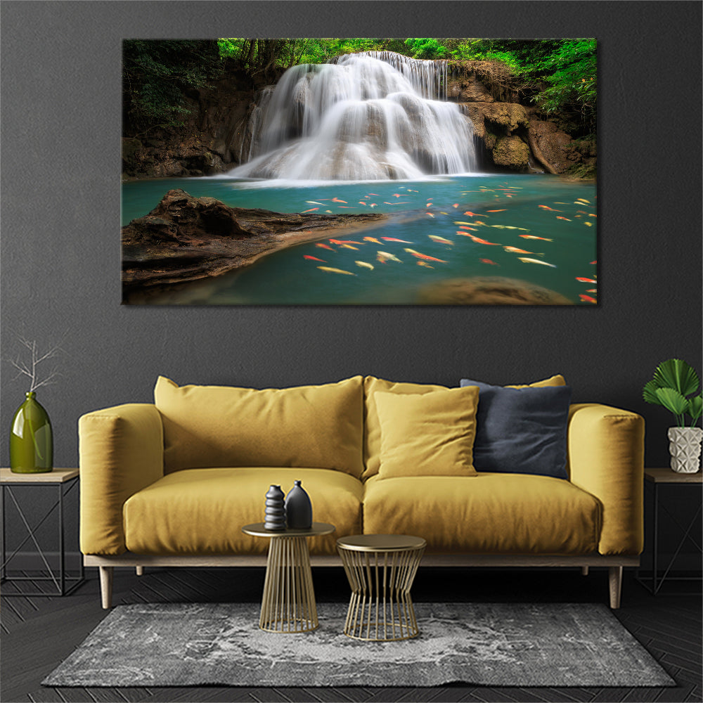 Beautiful waterfall with golden goldfish